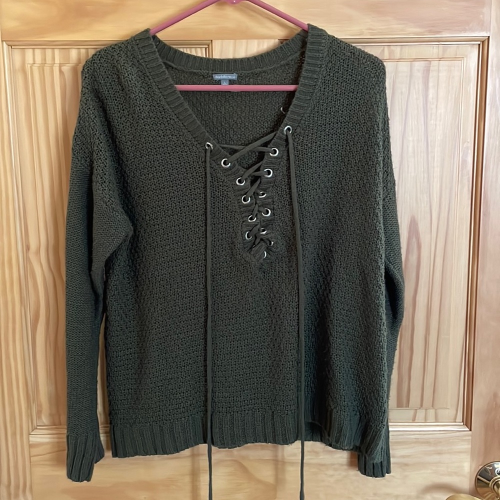 Lightly worn green sweater